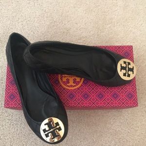 Black quilted Tory Burch Quinn mestico flats